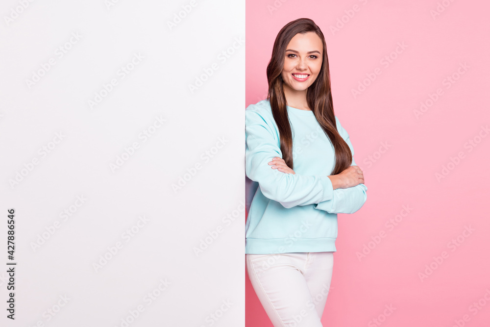 Photo of happy cheerful lady stand crossed hands white paper placard copyspace information isolated on pink color background Photo of happy cheerful lady stand crossed hands white paper placard copyspace information isolated on pink color background