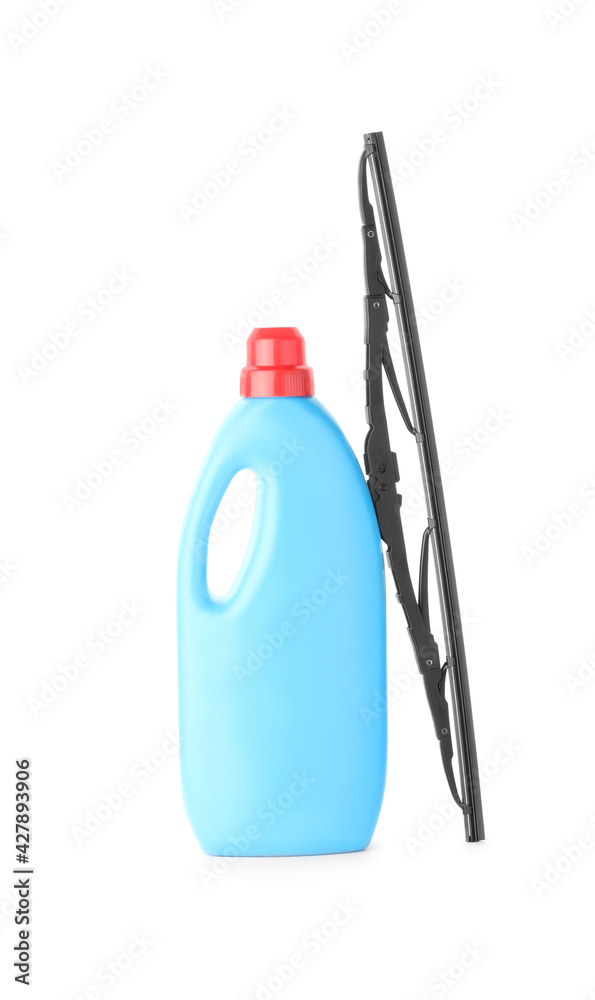 Fototapeta premium Bottle of windshield washer fluid and wiper on white background