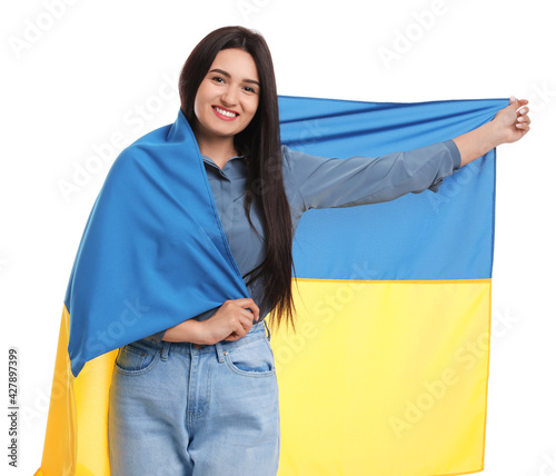 Young woman with flag of Ukraine on white background