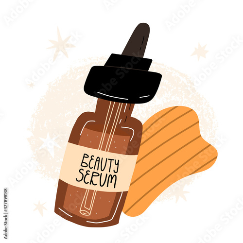 Gua sha or jade scraper and face beauty serum. Clean beauty, organic cosmetics, anti-aging routine concept.