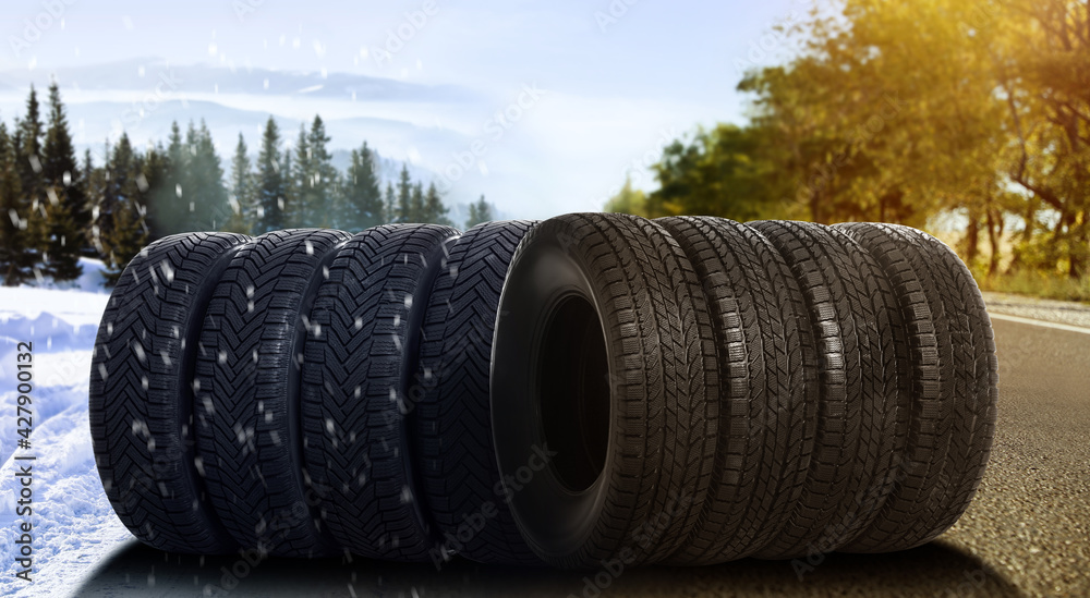 Set of new winter and summer tires on asphalt road, collage. Banner design Set of new winter and summer tires on asphalt road, collage. Banner design