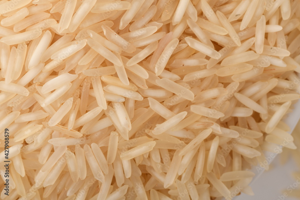 Pile of brown rice isolated on white background. Pile of brown rice isolated on white background.