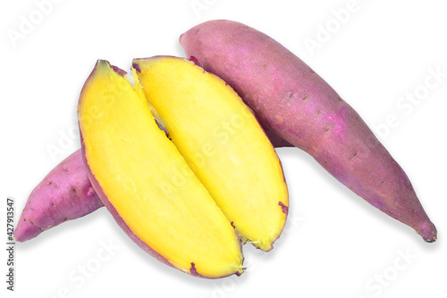 Japanese sweet potatoes. Cooked whole and halved sweet potatoes,isolated on white background