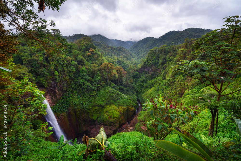Catarata del Toro waterfall with surrounding mountains in Costa Rica