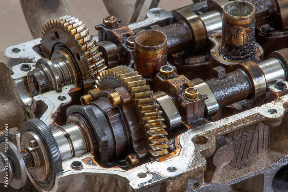 camshaft gears on the head of the car engine. Car engine repair. camshaft gears on the head of the car engine. Car engine repair.