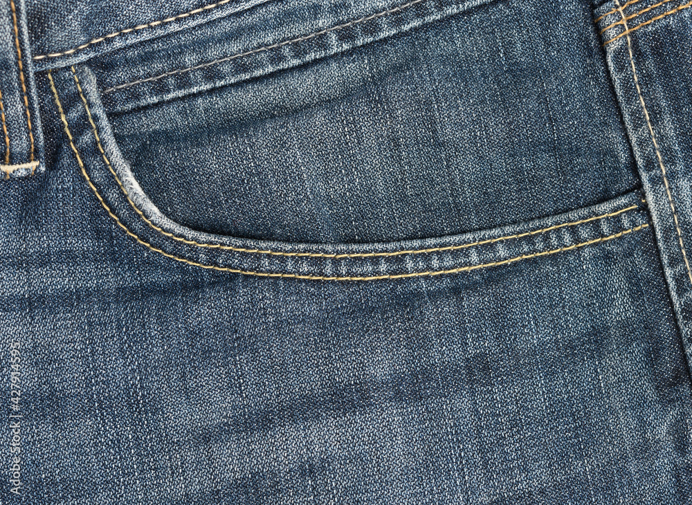 front pocket of blue classic jeans, full frame front pocket of blue classic jeans, full frame