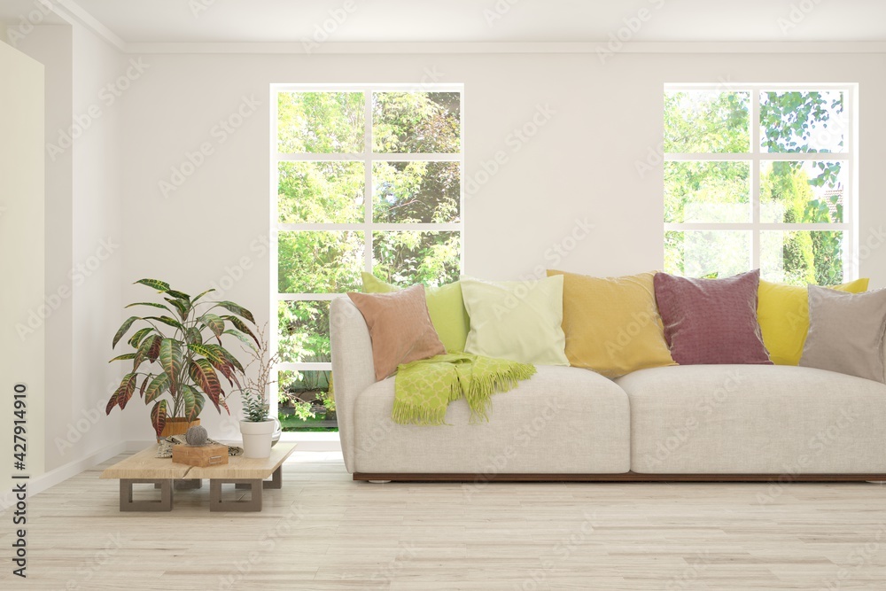 Fototapeta premium White living room with sofa and summer landscape in window. Scandinavian interior design. 3D illustration