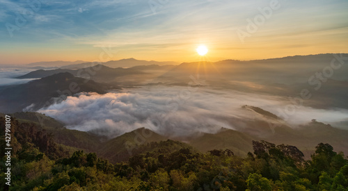 Beautiful morning Sunrise and Fog flow over mountain in Ai yerweng, Yala, Thailand © lkunl