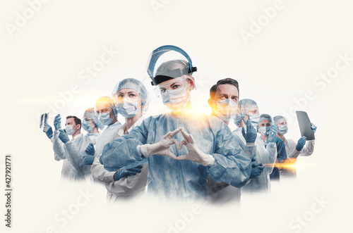 medical workers heroes. a nurse in the foreground in a mask and uniform holds her hands in the shape of a heart. go to a lot of medical professionals.