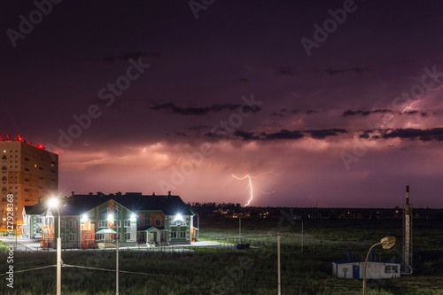 Lightning over the houses