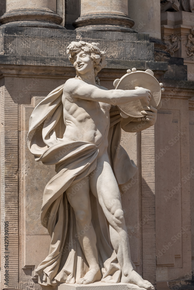 Obraz premium Sculpture, architectural detail in the Zwinger, a palatial complex in the baroque style in Dresden, Germany. The most famous architectural monument of Dresden