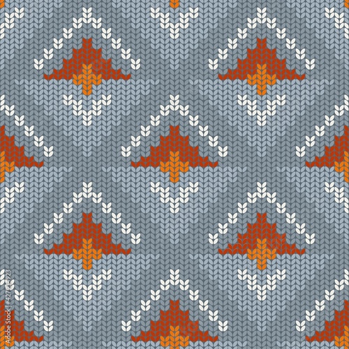 Geometric seamless retro pattern in knitted style, abstract sprout or flower. Stock vector illustration for web, print, background and wallpaper, scrapbooking and wrapping paper.