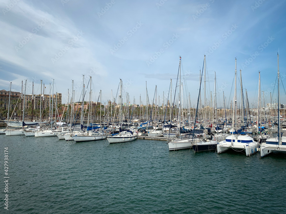 Rows of yachts in Port Vell, Barcelona, Spain. View from Rambla De Mar dock.