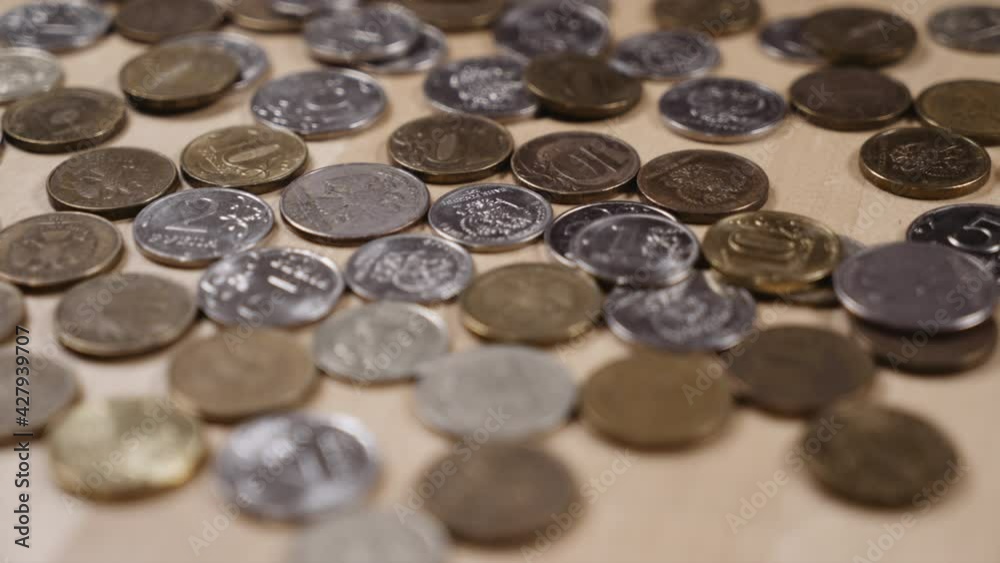 panoramic shooting of coins lying on the table panoramic shooting of coins lying on the table