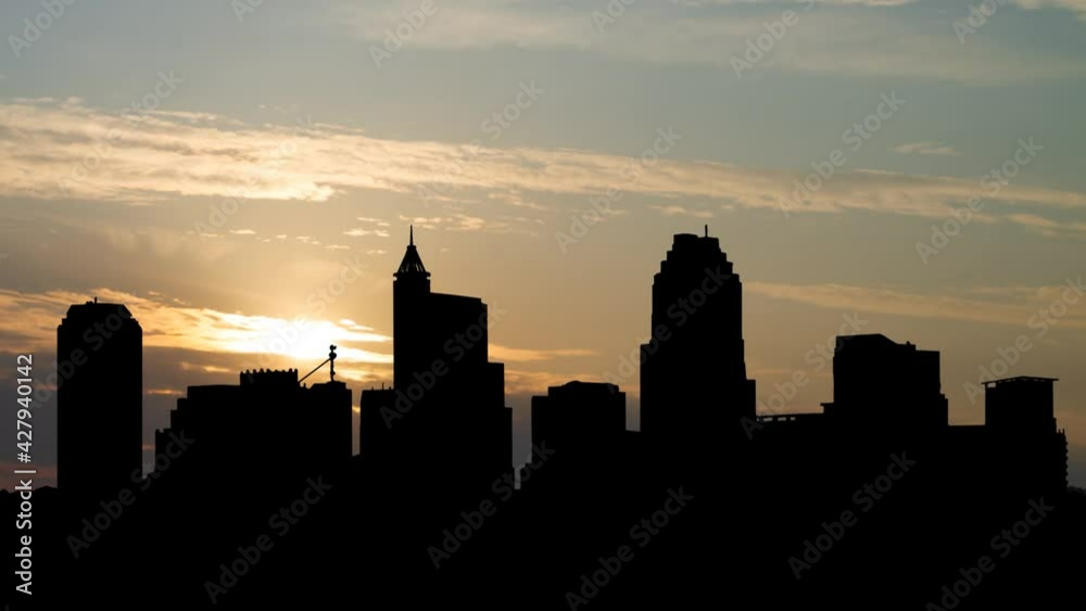 Raleigh: Downtown Skyline at Sunrise,Time Lapse with Colorful Clouds, North Carolina, USA Raleigh: Downtown Skyline at Sunrise,Time Lapse with Colorful Clouds, North Carolina, USA