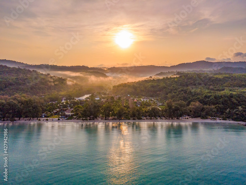 Aerial view of nature tropical paradise island beach enjoin a good summer beautiful time on the beach with clear water and blue sky in Koh kood or Ko Kut, Thailand. © Narin Sapaisarn