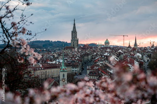 fantastic sunset during cherry blossom with the oldtown of Bern, Switzerland