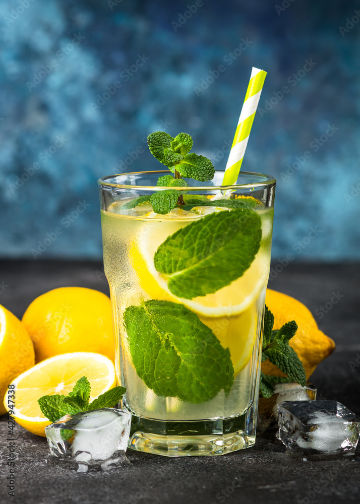 Fototapeta premium Lemonad in the glass at dark table.
