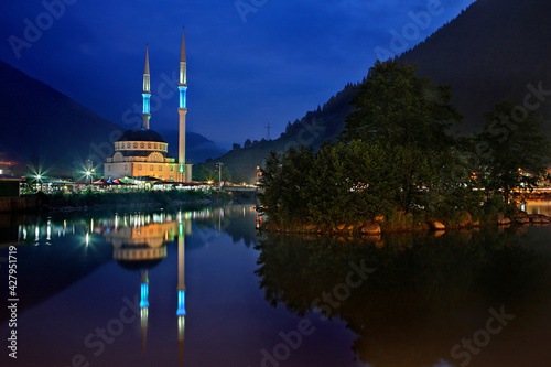A mosque reflected in Uzun lake (Uzungol), Trabzon Province, Black Sea region, Turkey.