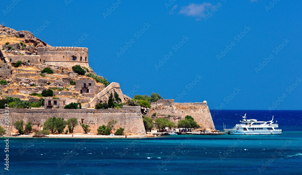  Spinalonga island and castle, former leper colony, in Mirabello bay, Agios Nikolaos municipality, Lasithi prefecture, Crete, Greece.