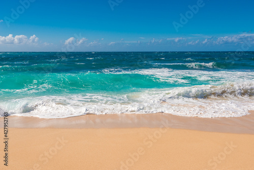 Beautiful beach and tropical sea. Sand and water vacation background.