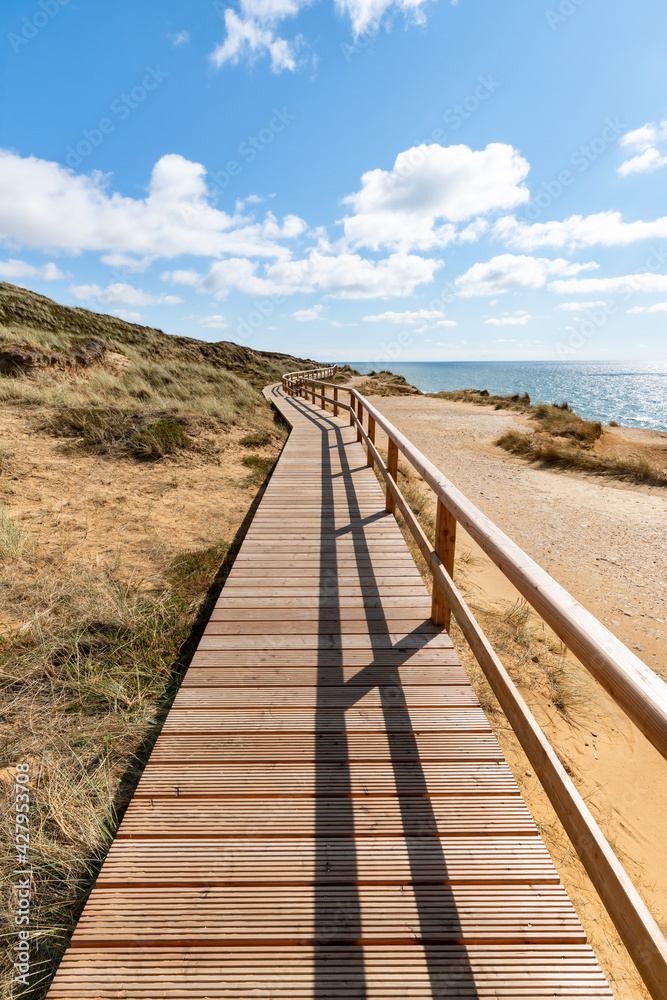 Wooden boardwalk along the Rotes Kliff (red cliff), Sylt, Schleswig-Holstein, Germany
