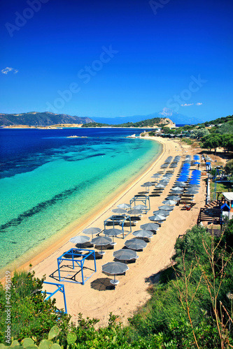 Fototapeta Naklejka Na Ścianę i Meble -  Megali Ammos beach, Ammouliani island. In the background you can see Mount Athos. Chalkidiki, Macedonia, Greece.
