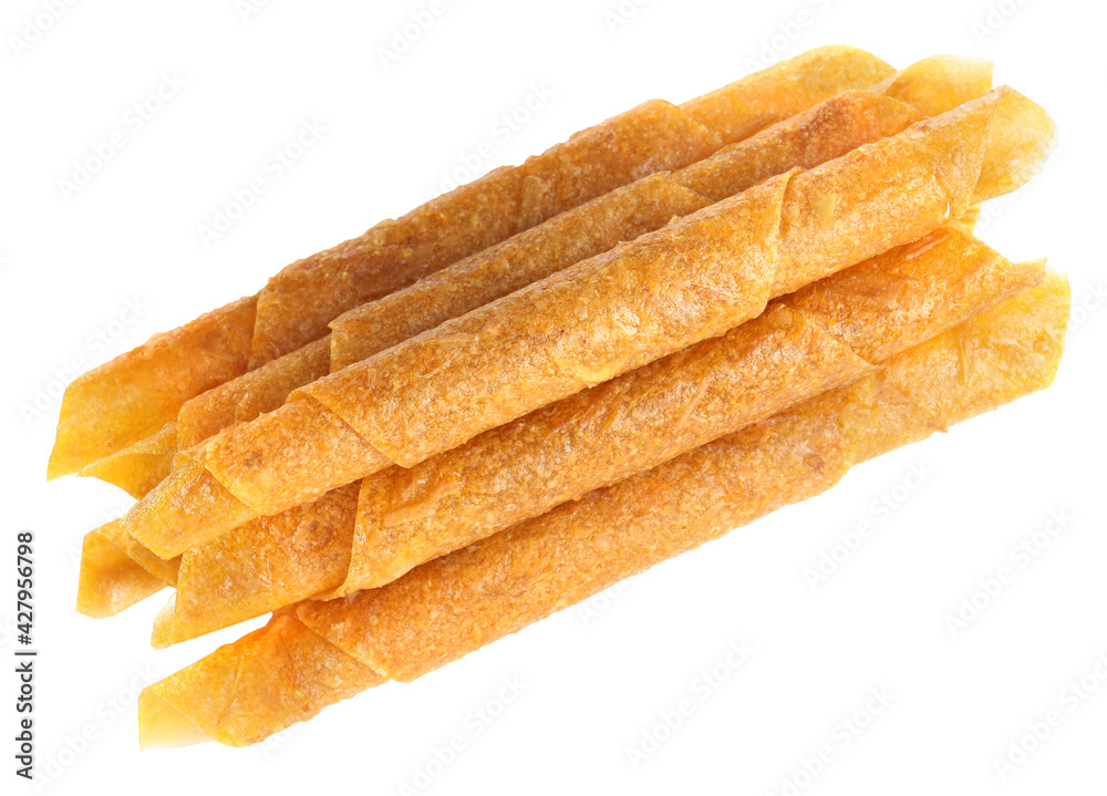 Delicious fruit leather rolls on white background, top view Delicious fruit leather rolls on white background, top view
