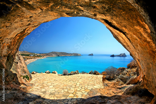 "Through" the cave you can see one of the many beautiful beaches at Xerokambos, Sitia, Lasithi, Crete, Greece.