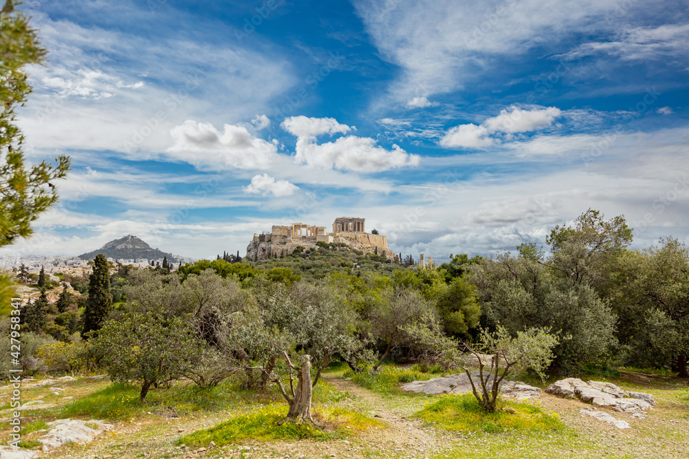 Athens, Greece, Acropolis hill, blue cloudy sky background