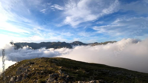 Clouds over the mountains photo