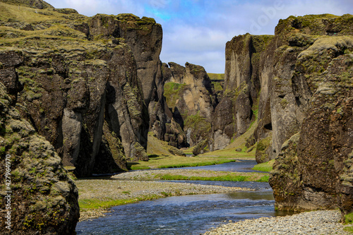 River flowing through beautiful Fjadrargljufur canyon, near Kirkjubaejarklaustur, Iceland
