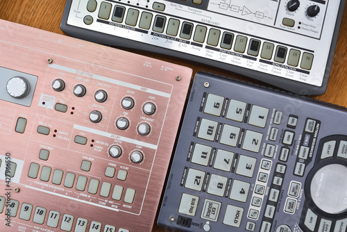 Top view of electronic synthesizer, drum machine and sampler. Studio equipment and devices for professional musicians to create electronic music, analog sound and live performances.