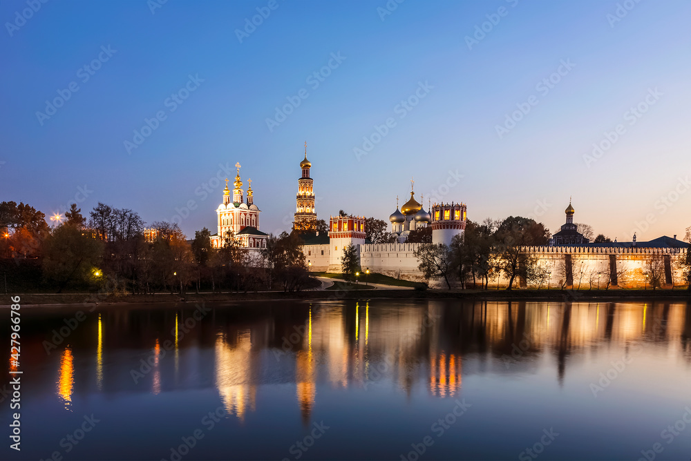 View of the Novodevichy Women's Monastery and its reflection in the pond. Moscow, Russia