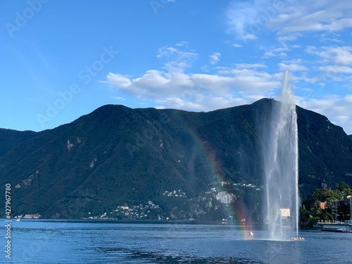 waterfall and rainbow over the lake
