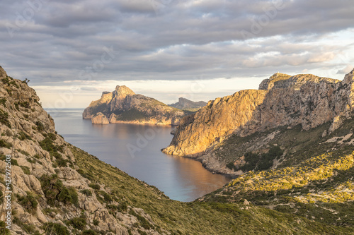 Views over the Formentor peninsula with the watchtower Torre de Albercutx and the famous rock Es Colomer
