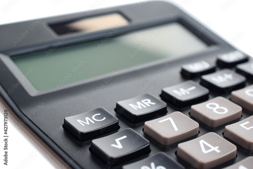 Black plastic digital calculator, isolated on a white background, close-up. Symbol economics, mathematics, accounting, finance concept. The day of knowledge, to calculate, to count money Black plastic digital calculator, isolated on a white background, close-up. Symbol economics, mathematics, accounting, finance concept. The day of knowledge, to calculate, to count money