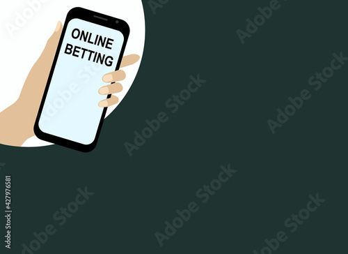 Mobile phone in hand with online betting application