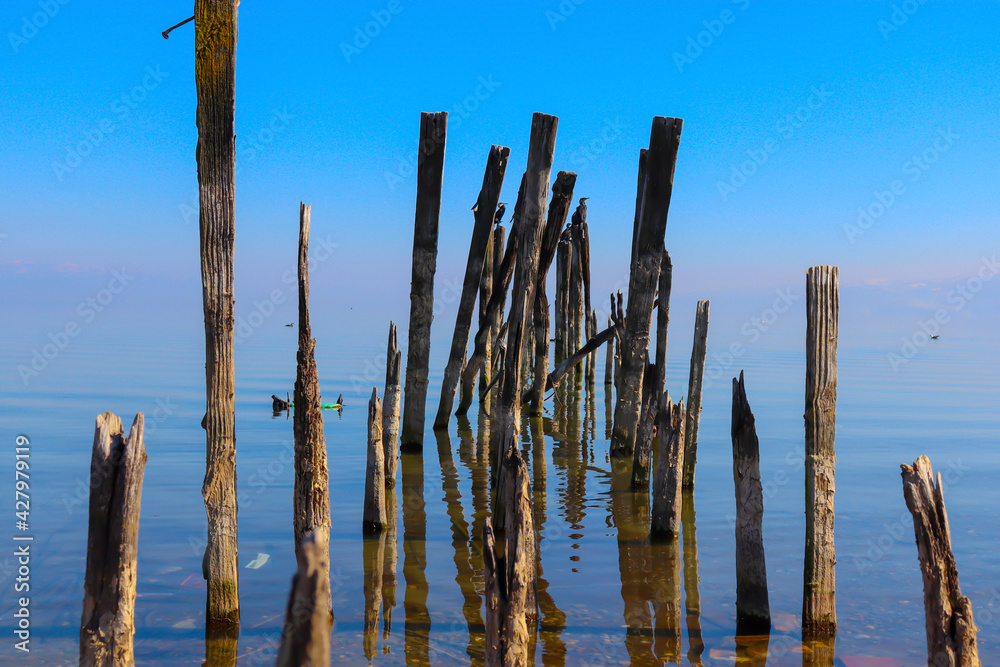 Old and Destroyed Pier in the Lake