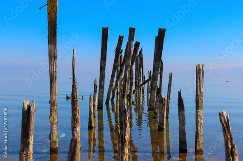 Old and Destroyed Pier in the Lake © byyszr
