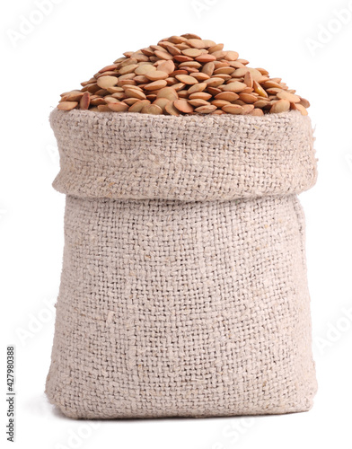 Lentils in bag isolated on white background