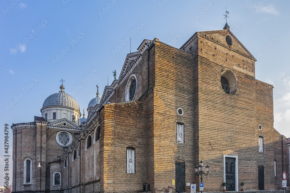 Architectural fragments of Padua Abbey of St. Justina (Abbazia di Santa Giustina - X century Benedictine abbey complex) in front of Prato della Valle square. Padua, Veneto, Italy, Europe.