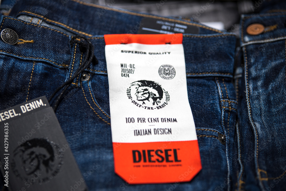 Berlin, Germany - September 30, 2020: Folded Diesel jeans on a store shelf  Stock Photo | Adobe Stock