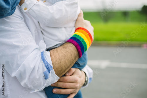 Homosexual father holding his son - Adoption concept © Xavier Lorenzo