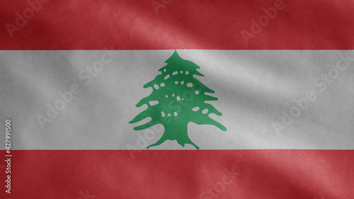 Lebanese flag waving in the wind. Close up of Lebanon banner blowing soft silk.