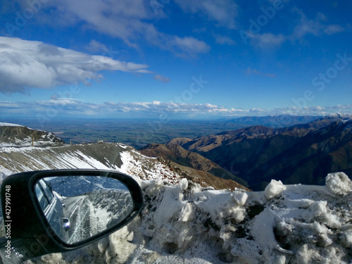 looking at the valley from the road on top of the mountain