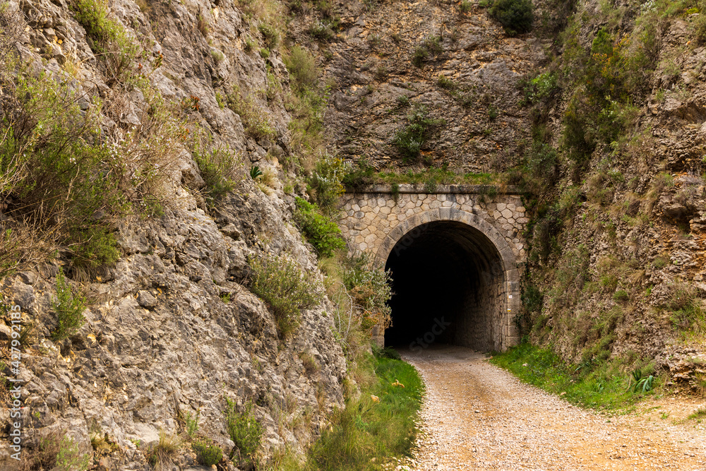 Tunnel in the old train track near the Serpis River in Villalonga.