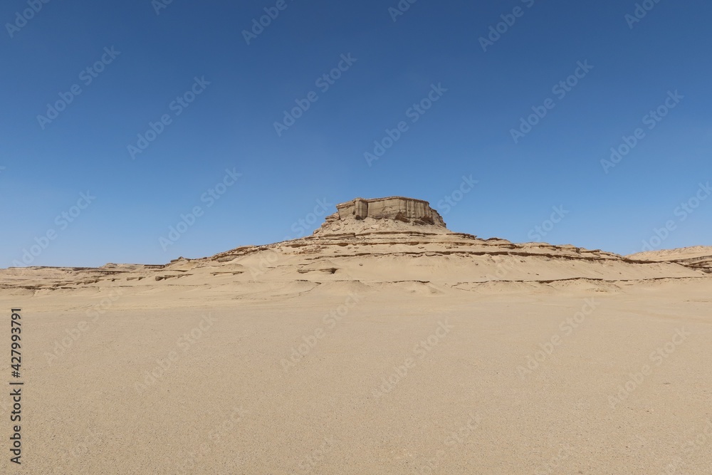 The beautiful sands and rocks formations due to erosion in Fayoum desert in Egypt The beautiful sands and rocks formations due to erosion in Fayoum desert in Egypt