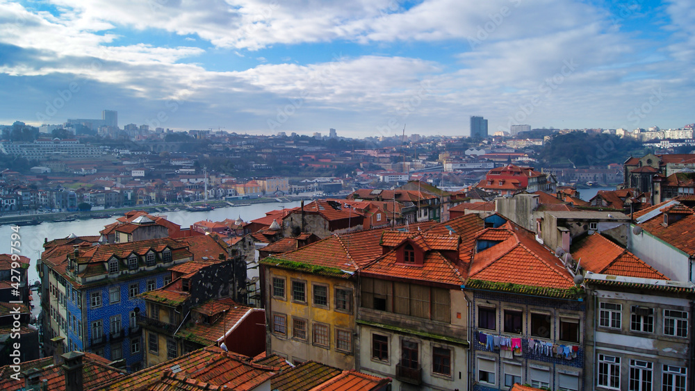 Panorama view of an old part of Porto, Portugal. Red roofs and old buildings Town architecture.