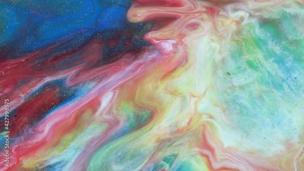 Deep ink spaces. Red, yellow streaks on the bed blue background. Moving abstract colorful background. Mixing paints. Deep ink spaces. Red, yellow streaks on the bed blue background. Moving abstract colorful background. Mixing paints.
